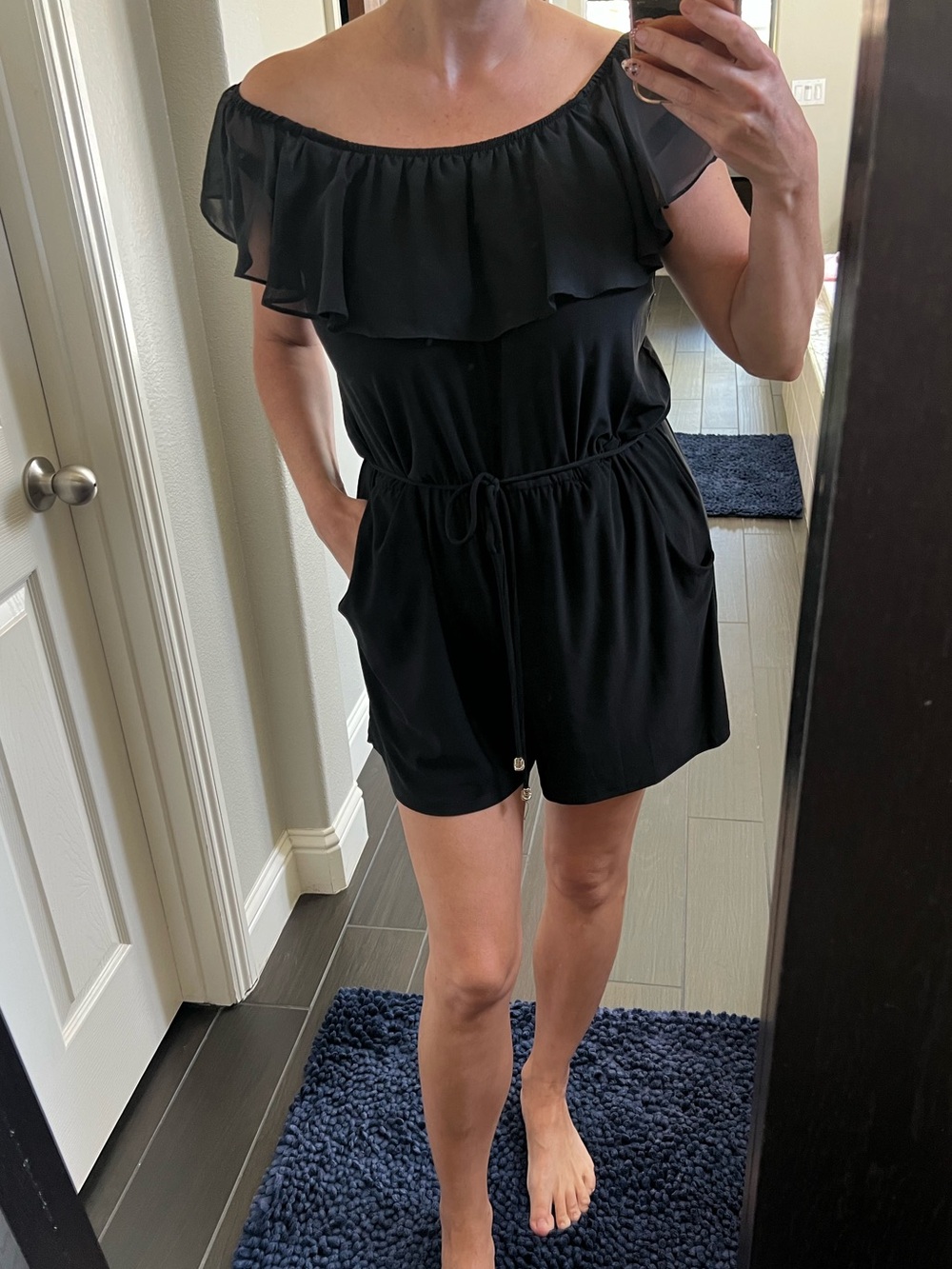 Wrapper Black Off-Shoulder Ruffle Romper